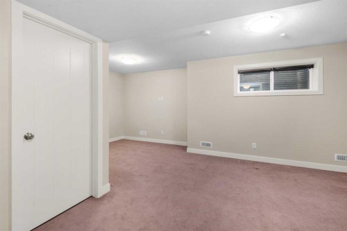 431 Quarry Villas Se, Calgary, AB - Indoor Photo Showing Other Room
