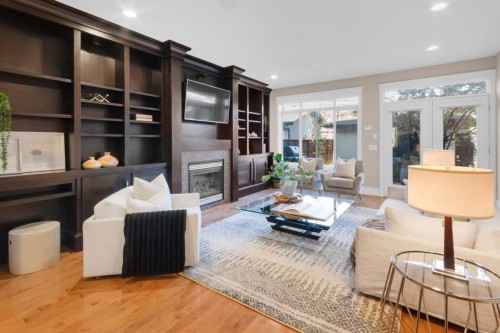 2046 49 Avenue Sw, Calgary, AB - Indoor Photo Showing Living Room With Fireplace