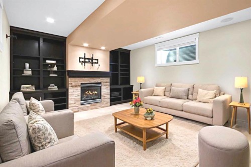 2046 49 Avenue Sw, Calgary, AB - Indoor Photo Showing Living Room With Fireplace