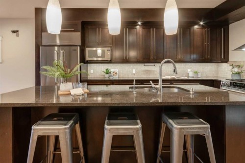 2046 49 Avenue Sw, Calgary, AB - Indoor Photo Showing Kitchen With Stainless Steel Kitchen With Double Sink With Upgraded Kitchen
