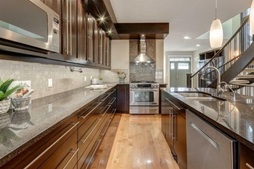 2046 49 Avenue Sw, Calgary, AB - Indoor Photo Showing Kitchen With Stainless Steel Kitchen With Double Sink With Upgraded Kitchen