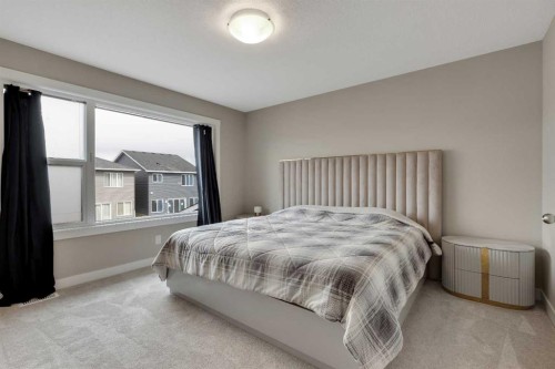 216 Creekstone Row Sw, Calgary, AB - Indoor Photo Showing Bedroom