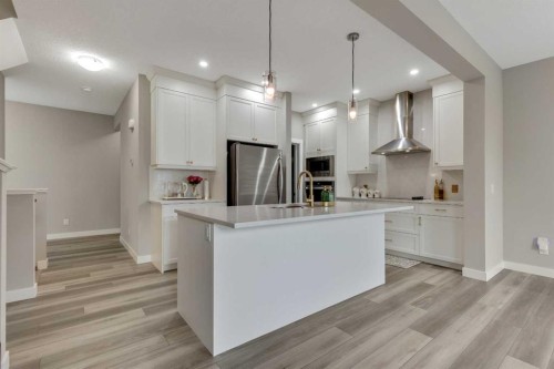 216 Creekstone Row Sw, Calgary, AB - Indoor Photo Showing Kitchen With Upgraded Kitchen