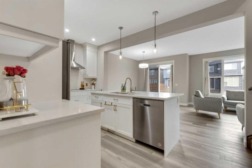 216 Creekstone Row Sw, Calgary, AB - Indoor Photo Showing Kitchen With Upgraded Kitchen
