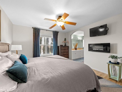 97 Evansbrooke Way Nw, Calgary, AB - Indoor Photo Showing Bedroom