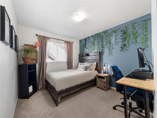 97 Evansbrooke Way Nw, Calgary, AB - Indoor Photo Showing Bedroom