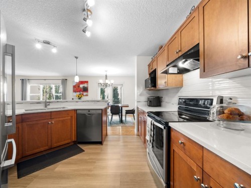 97 Evansbrooke Way Nw, Calgary, AB - Indoor Photo Showing Kitchen With Stainless Steel Kitchen
