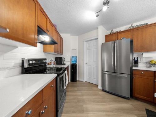 97 Evansbrooke Way Nw, Calgary, AB - Indoor Photo Showing Kitchen