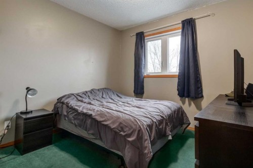 168 Mt Apex Green Se, Calgary, AB - Indoor Photo Showing Bedroom