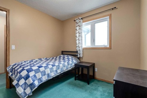 168 Mt Apex Green Se, Calgary, AB - Indoor Photo Showing Bedroom