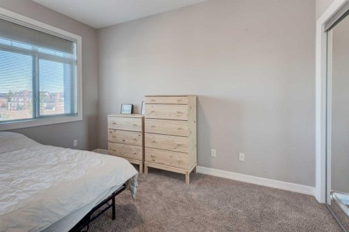 401-117 Copperpond Common Se, Calgary, AB - Indoor Photo Showing Bedroom