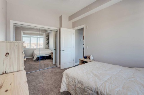 401-117 Copperpond Common Se, Calgary, AB - Indoor Photo Showing Bedroom