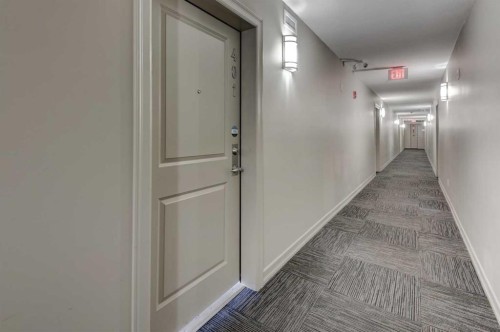 401-117 Copperpond Common Se, Calgary, AB - Indoor Photo Showing Other Room