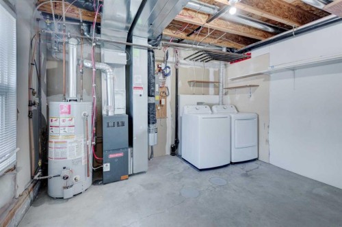 66 Cedarwood Lane Sw, Calgary, AB - Indoor Photo Showing Laundry Room