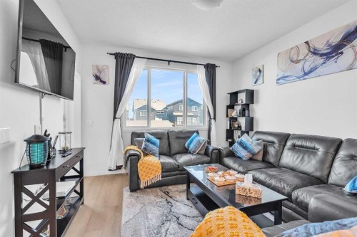 52 Edith Gate Nw, Calgary, AB - Indoor Photo Showing Living Room