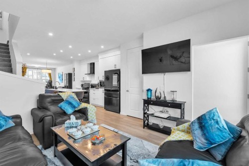 52 Edith Gate Nw, Calgary, AB - Indoor Photo Showing Living Room