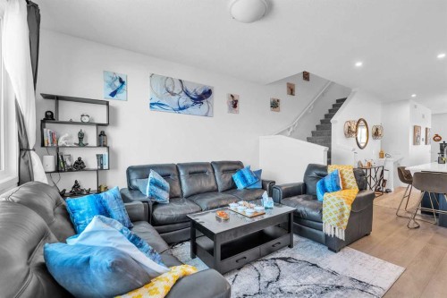 52 Edith Gate Nw, Calgary, AB - Indoor Photo Showing Living Room