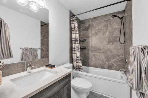 52 Edith Gate Nw, Calgary, AB - Indoor Photo Showing Bathroom