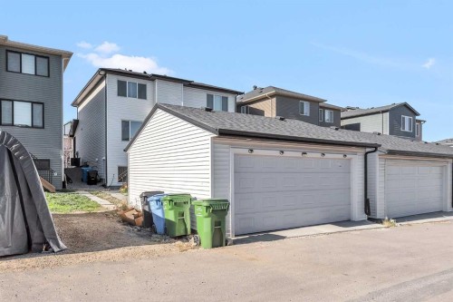52 Edith Gate Nw, Calgary, AB - Outdoor With Exterior