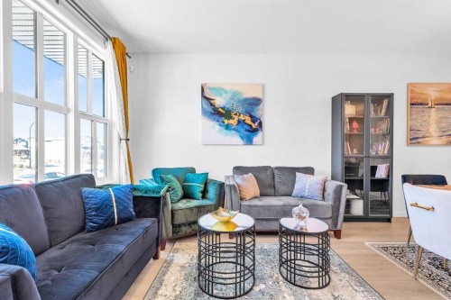 52 Edith Gate Nw, Calgary, AB - Indoor Photo Showing Living Room