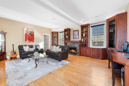 339 Bridlewood Court Sw, Calgary, AB - Indoor Photo Showing Living Room With Fireplace