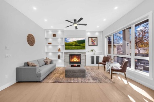 1623 16A Street Se, Calgary, AB - Indoor Photo Showing Living Room With Fireplace