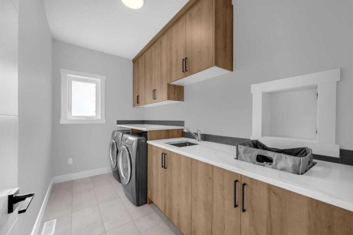 1623 16A Street Se, Calgary, AB - Indoor Photo Showing Laundry Room