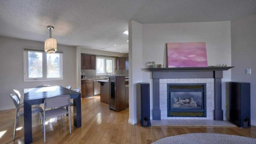 5650 Brenner Crescent Nw, Calgary, AB - Indoor Photo Showing Other Room With Fireplace