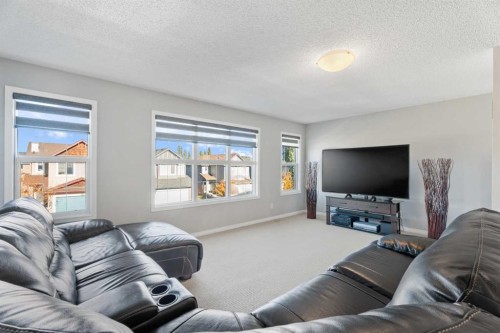 106 Copperstone Close Se, Calgary, AB - Indoor Photo Showing Living Room