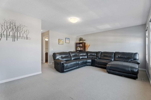 106 Copperstone Close Se, Calgary, AB - Indoor Photo Showing Living Room