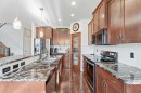 106 Copperstone Close Se, Calgary, AB  - Indoor Photo Showing Kitchen With Double Sink With Upgraded Kitchen 