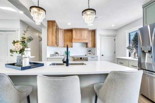 146 Springwood Drive Sw, Calgary, AB - Indoor Photo Showing Kitchen With Upgraded Kitchen