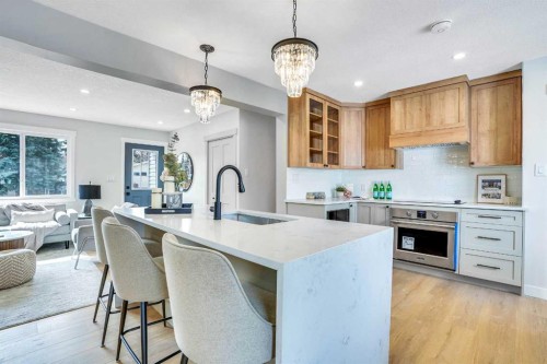 146 Springwood Drive Sw, Calgary, AB - Indoor Photo Showing Kitchen With Upgraded Kitchen