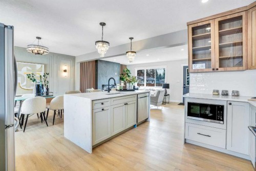 146 Springwood Drive Sw, Calgary, AB - Indoor Photo Showing Kitchen With Upgraded Kitchen