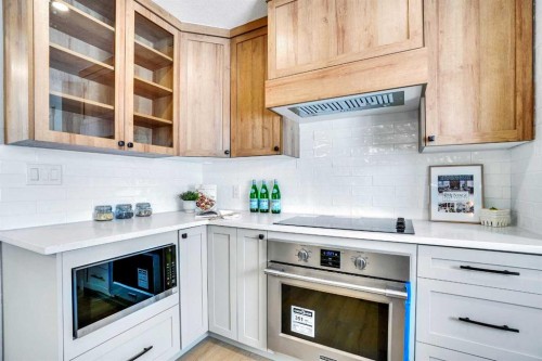 146 Springwood Drive Sw, Calgary, AB - Indoor Photo Showing Kitchen