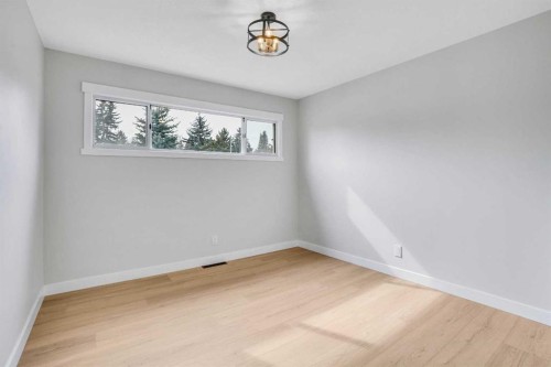 146 Springwood Drive Sw, Calgary, AB - Indoor Photo Showing Other Room