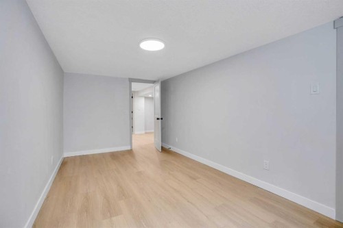 146 Springwood Drive Sw, Calgary, AB - Indoor Photo Showing Other Room