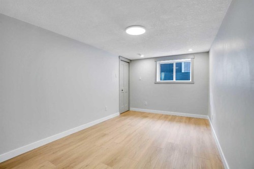 146 Springwood Drive Sw, Calgary, AB - Indoor Photo Showing Other Room