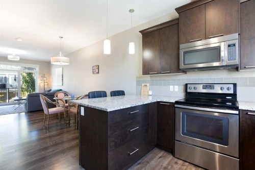 107 Evanston Manor Nw, Calgary, AB - Indoor Photo Showing Kitchen With Upgraded Kitchen