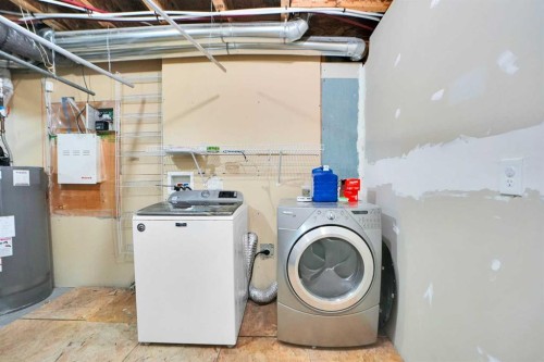 3 Saddleland Crescent Ne, Calgary, AB - Indoor Photo Showing Laundry Room
