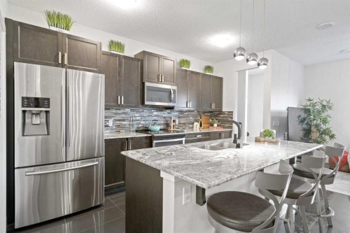 40 Cornerstone Avenue Ne, Calgary, AB - Indoor Photo Showing Kitchen With Double Sink With Upgraded Kitchen