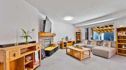 148 Covepark Close Ne, Calgary, AB - Indoor Photo Showing Living Room With Fireplace