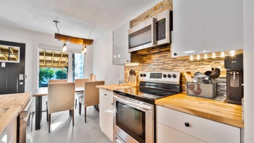 148 Covepark Close Ne, Calgary, AB - Indoor Photo Showing Kitchen With Stainless Steel Kitchen With Upgraded Kitchen