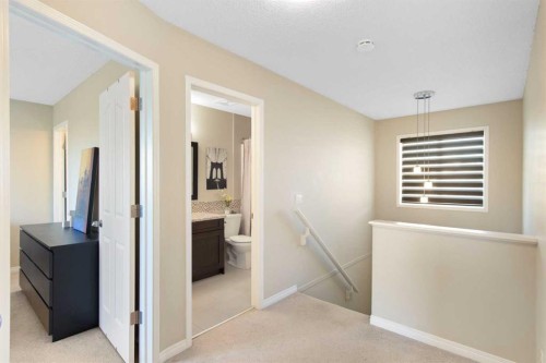 38 Spring Crescent Sw, Calgary, AB - Indoor Photo Showing Other Room