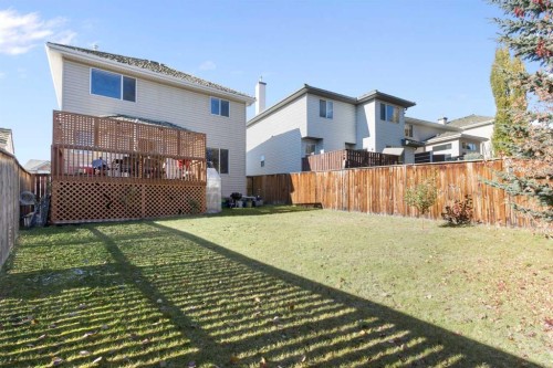 38 Spring Crescent Sw, Calgary, AB - Outdoor With Deck Patio Veranda