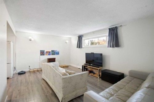 1452 Lake Sylvan Drive Se, Calgary, AB - Indoor Photo Showing Living Room