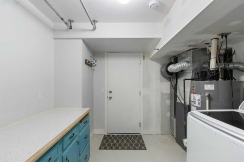 1452 Lake Sylvan Drive Se, Calgary, AB - Indoor Photo Showing Laundry Room