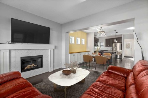 232 Copperpond Parade Se, Calgary, AB - Indoor Photo Showing Living Room With Fireplace