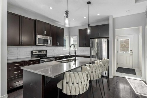 232 Copperpond Parade Se, Calgary, AB - Indoor Photo Showing Kitchen With Double Sink With Upgraded Kitchen