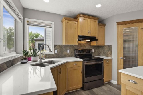 38 Simcoe Crescent Sw, Calgary, AB - Indoor Photo Showing Kitchen With Double Sink